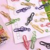 Set of 10 quality music musical treble clef coloured metal paper clips for stationary, cards, pictures, scrapbooking, art projects. Set of 10 quality music musical treble clef coloured metal paper clips for stationary, cards, pictures, scrapbooking, art projects.
